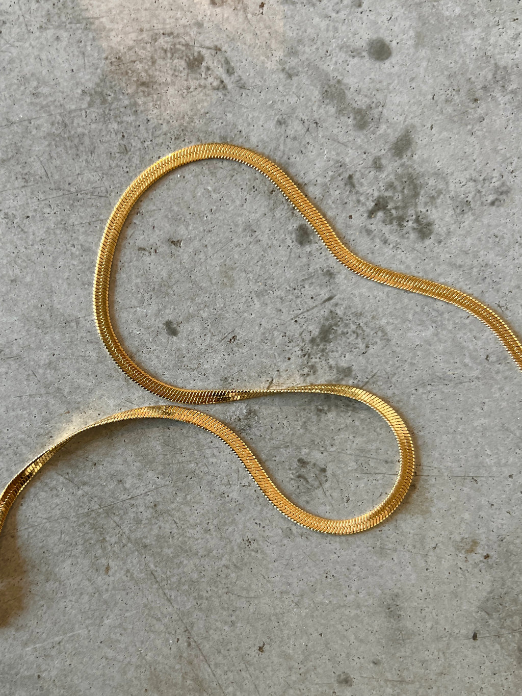 Cobra guld-set: matchande halsband & armband