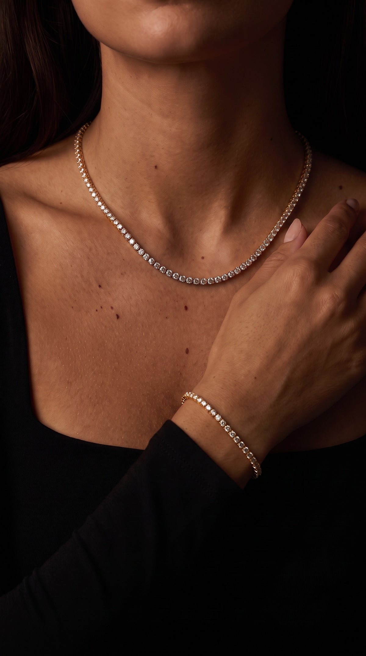 Amara tennis necklace - tennishalsband i rostfritt stål med 18K gulplätering och Aveline Tennis Bracelet. 