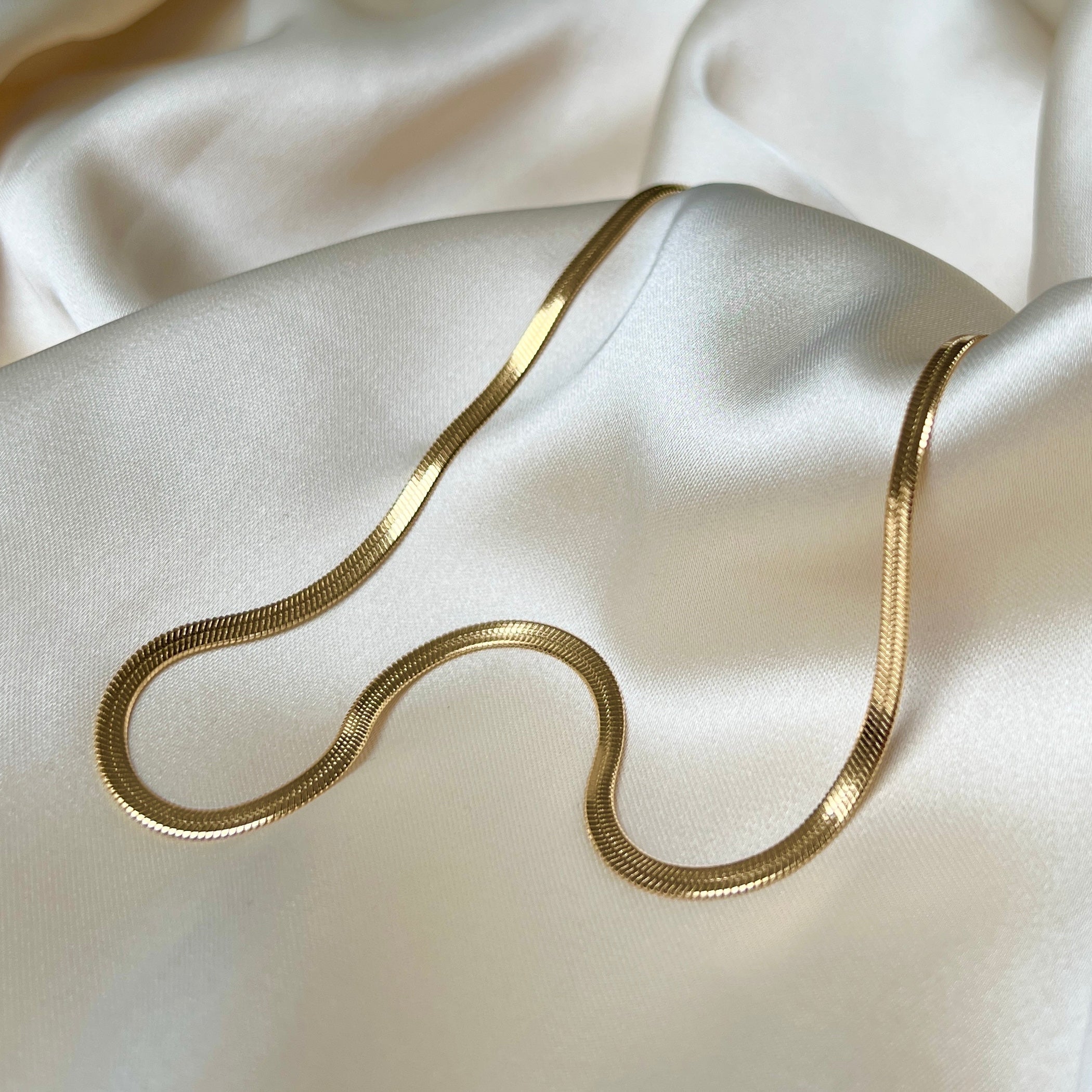 Cobra guld-set: matchande halsband & armband