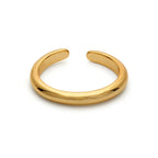 Tina Toe Ring – Justerbar guldig tåring med subtil glamour och elegant design.